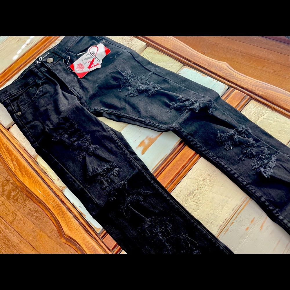 Girls’ skinny jeans ripped style size 9-10